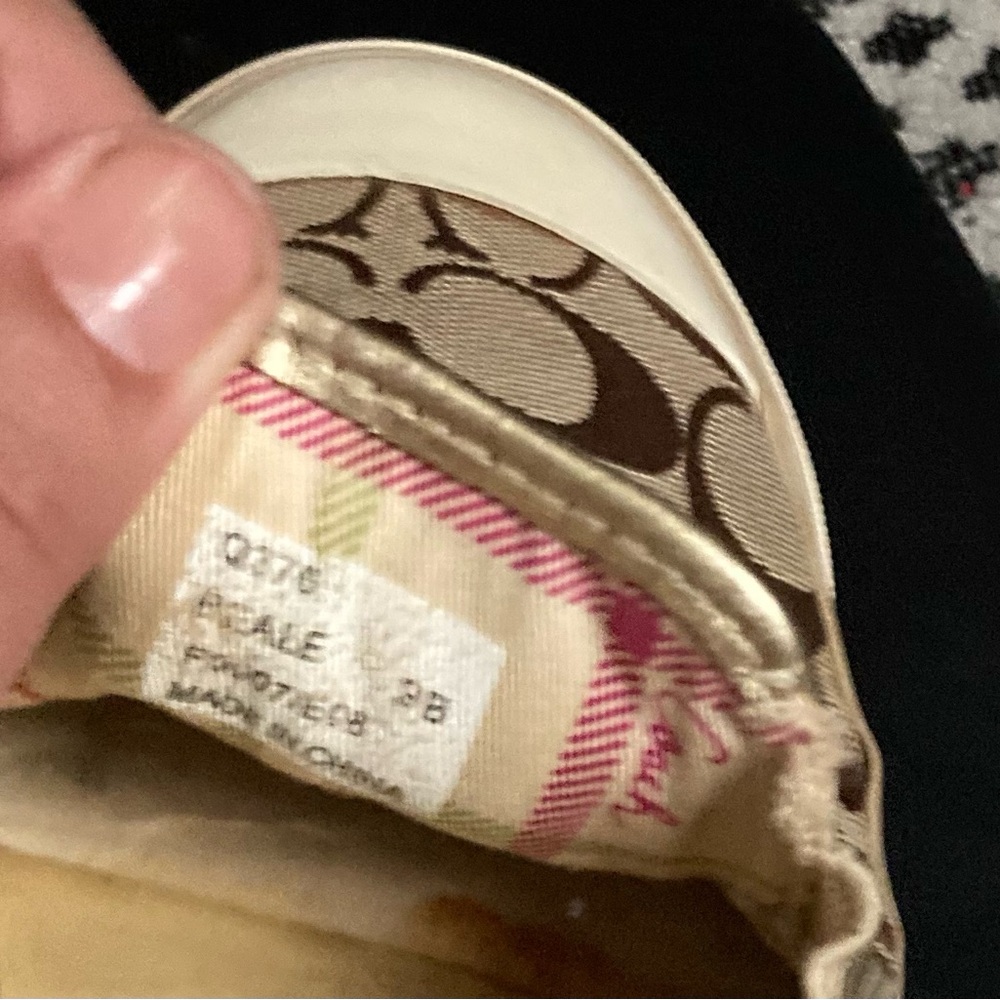 Women’s coach walking shoes.